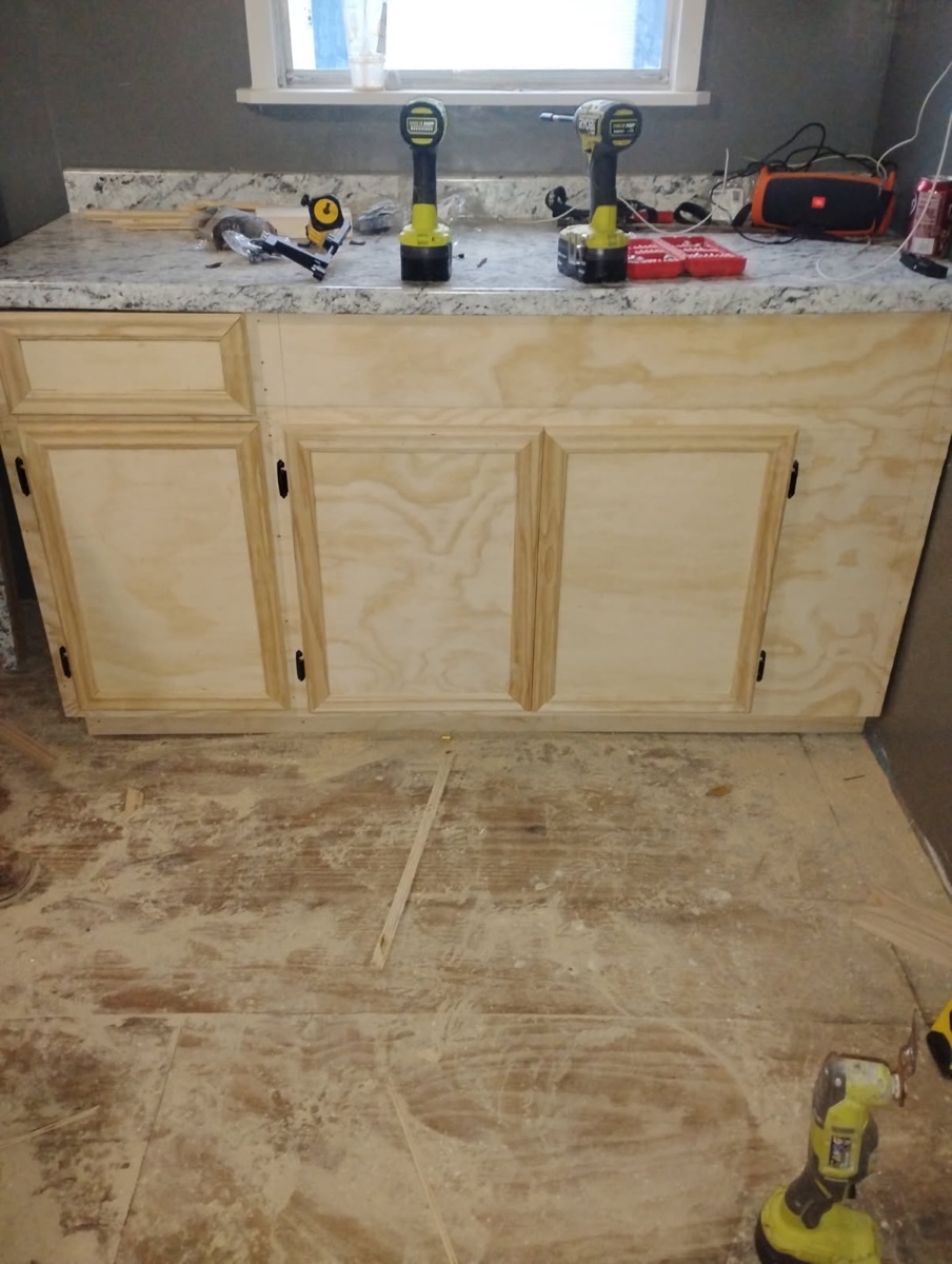 Custom cabinet build with countertop installation
